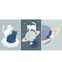 Three whimsical space-themed illustrations featuring a white cat and a dark blue cat. In the first image, the white cat stands on the back of the dark blue cat while reaching up to touch a glowing pink star as they sit together on a fluffy cloud. In the second image, the white cat stands playfully on a colorful ringed planet while the dark blue cat floats nearby holding a small moon like a ball, surrounded by stars. 