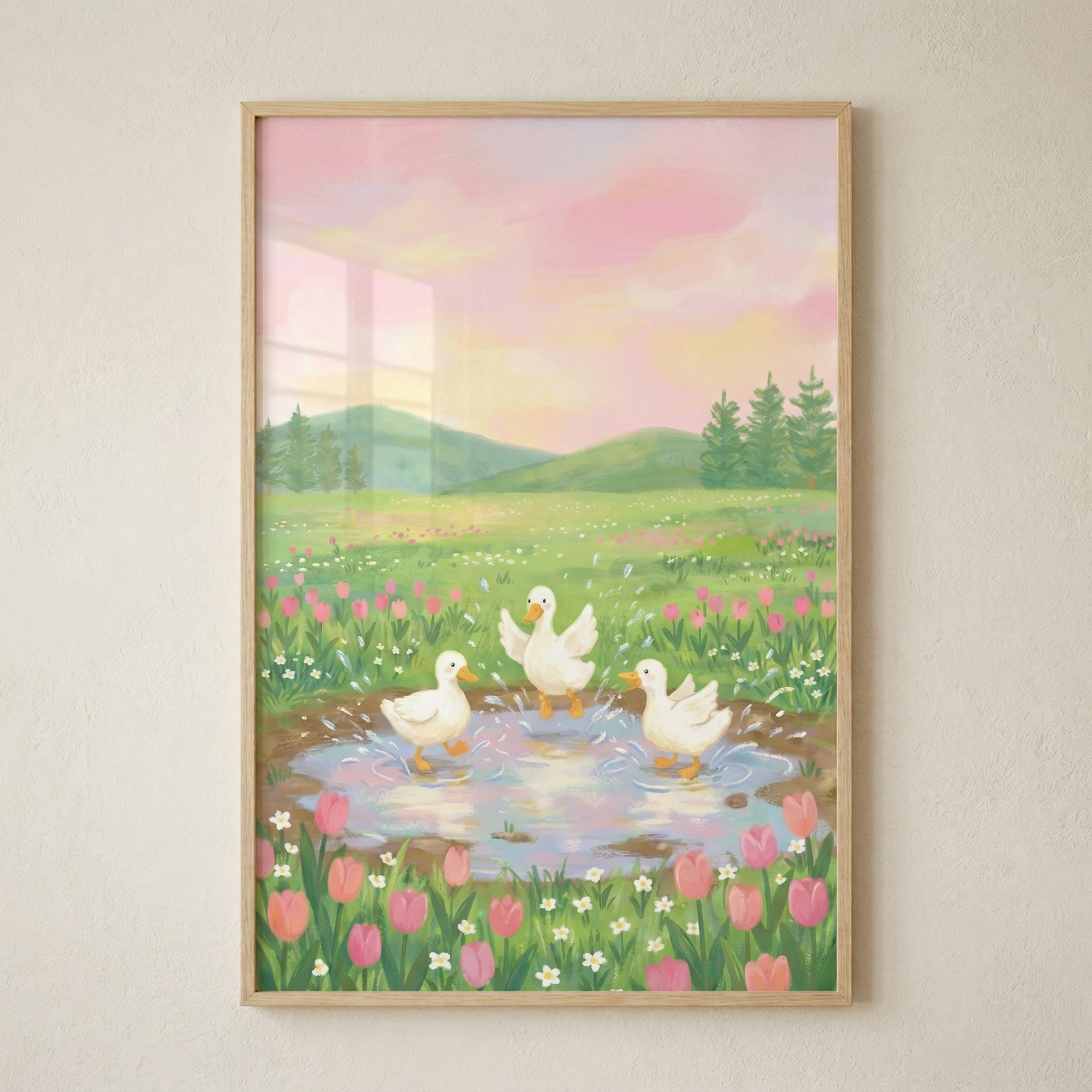 A whimsical digital illustration in a soft, storybook style. Three adorable white ducklings with orange beaks are splashing joyfully in a small, clear puddle in the middle of a lush green meadow. The meadow is densely filled with vibrant pink tulips and tiny white flowers. In the background, rolling green hills rise under a dreamy, pastel-colored sky featuring soft washes of pink, peach, and pale yellow, suggesting a peaceful sunset. The overall aesthetic is gentle and charming, with soft textures and a war