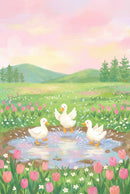 Three white ducklings splash and play in a shallow puddle surrounded by pink tulips and tiny white flowers in a wide spring meadow. Soft green hills and pine trees sit beneath a glowing pink sky, giving the scene a cheerful storybook feel.