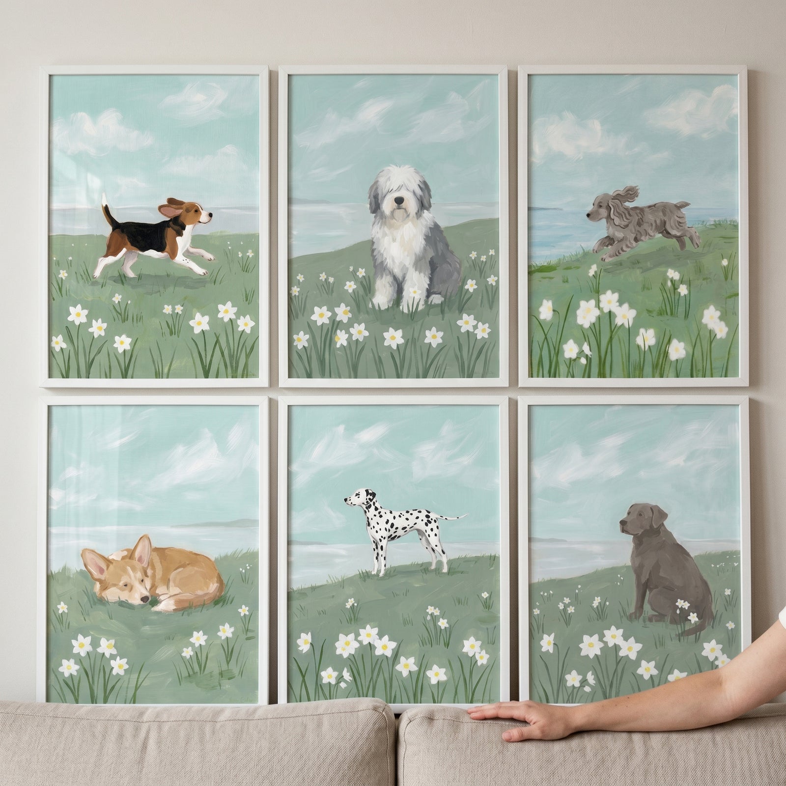 Spring flower meadow dog wall art set of 6 features various breeds in fields of white flowers under a light blue sky.
