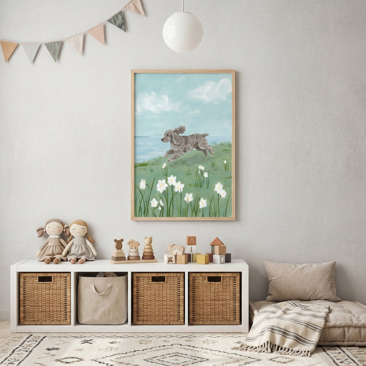 Spring meadow jumping spaniel dog wall art decorates a neutral nursery above a white storage unit with toys and baskets.