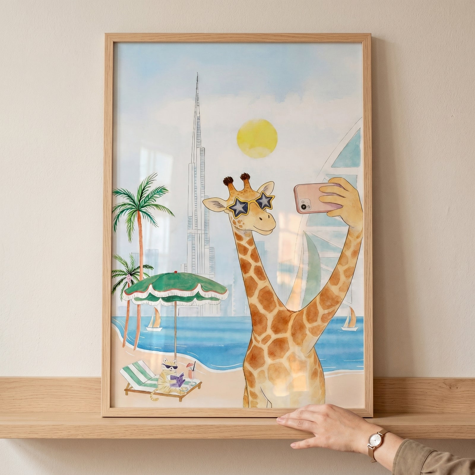 Star sunglasses giraffe wall art shows a giraffe taking a selfie on a beach near a tall skyscraper and palm trees.