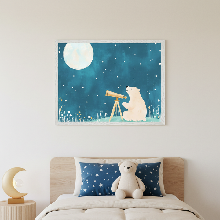 Kid's bedroom with a wooden bed, blue star pillow, and teddy bear. A moon lamp is on a bedside table. Above the bed, a framed illustration shows a polar bear with a telescope looking at a large moon and stars against a dark blue night sky.