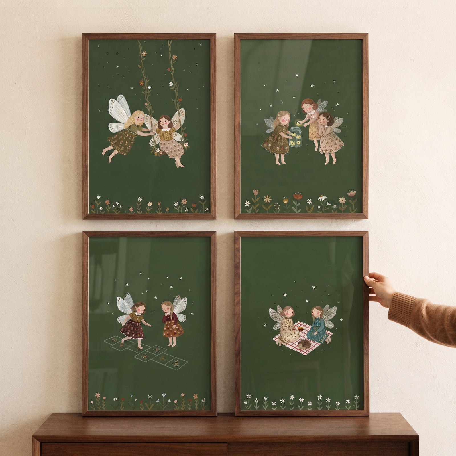 Starry deep green fairies wall art set of 4 features whimsical fairies playing in a night garden within wooden frames.