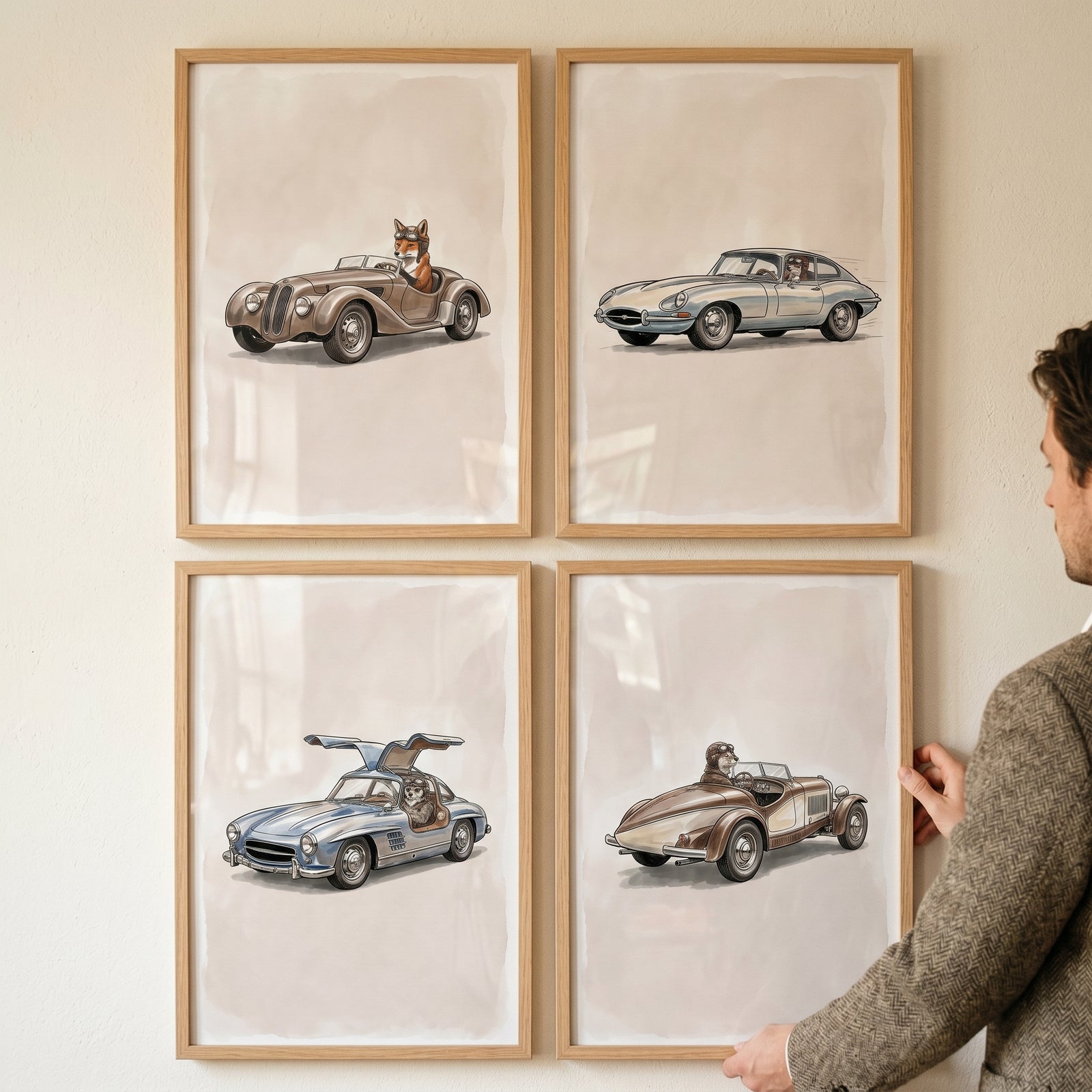 A man hangs a steering wheel racing animal wall art set of 4 featuring animals driving vintage cars in light wood frames.