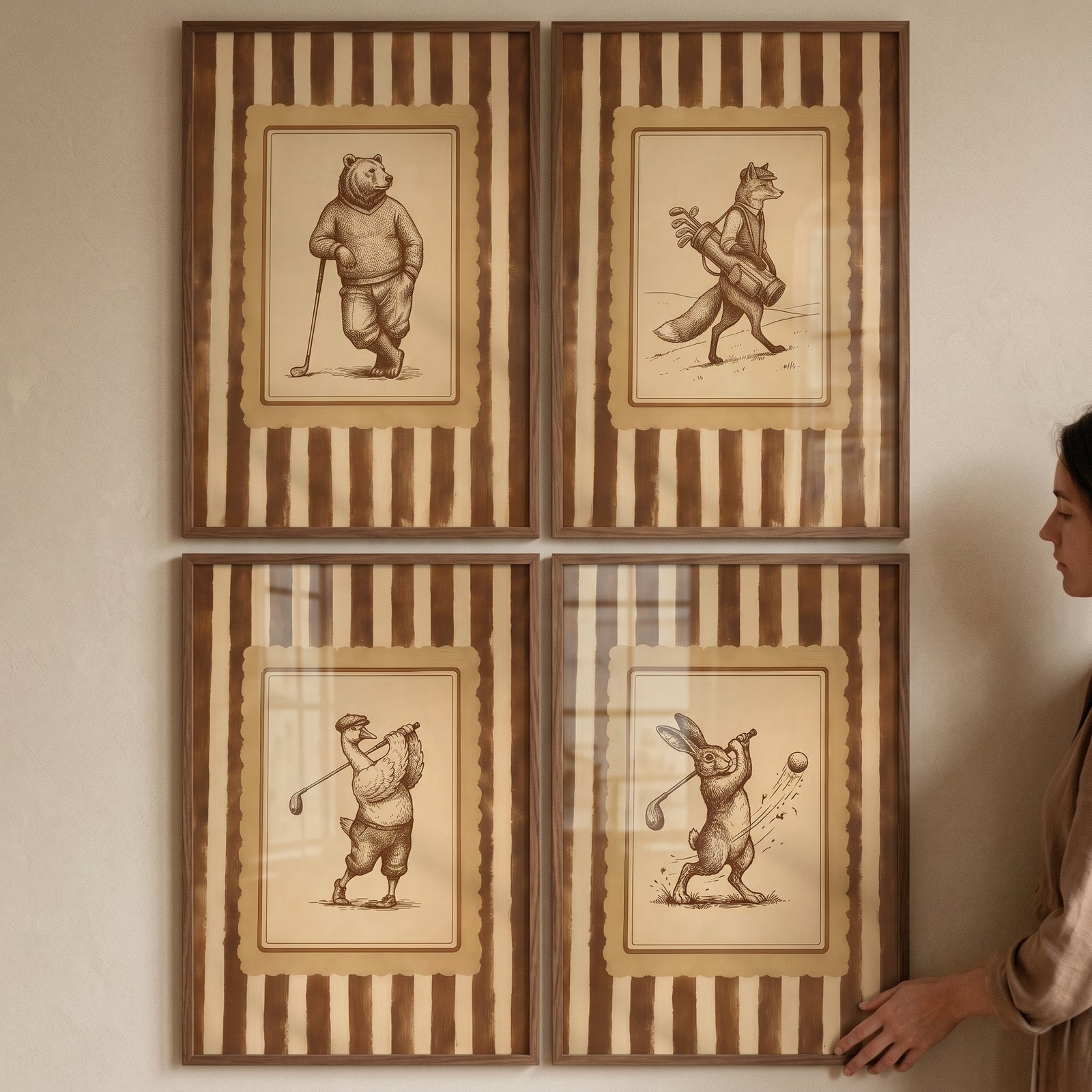 Striped background golfing animal wall art set of 4 features sepia drawings of a bear, fox, goose, and rabbit in wood frames.