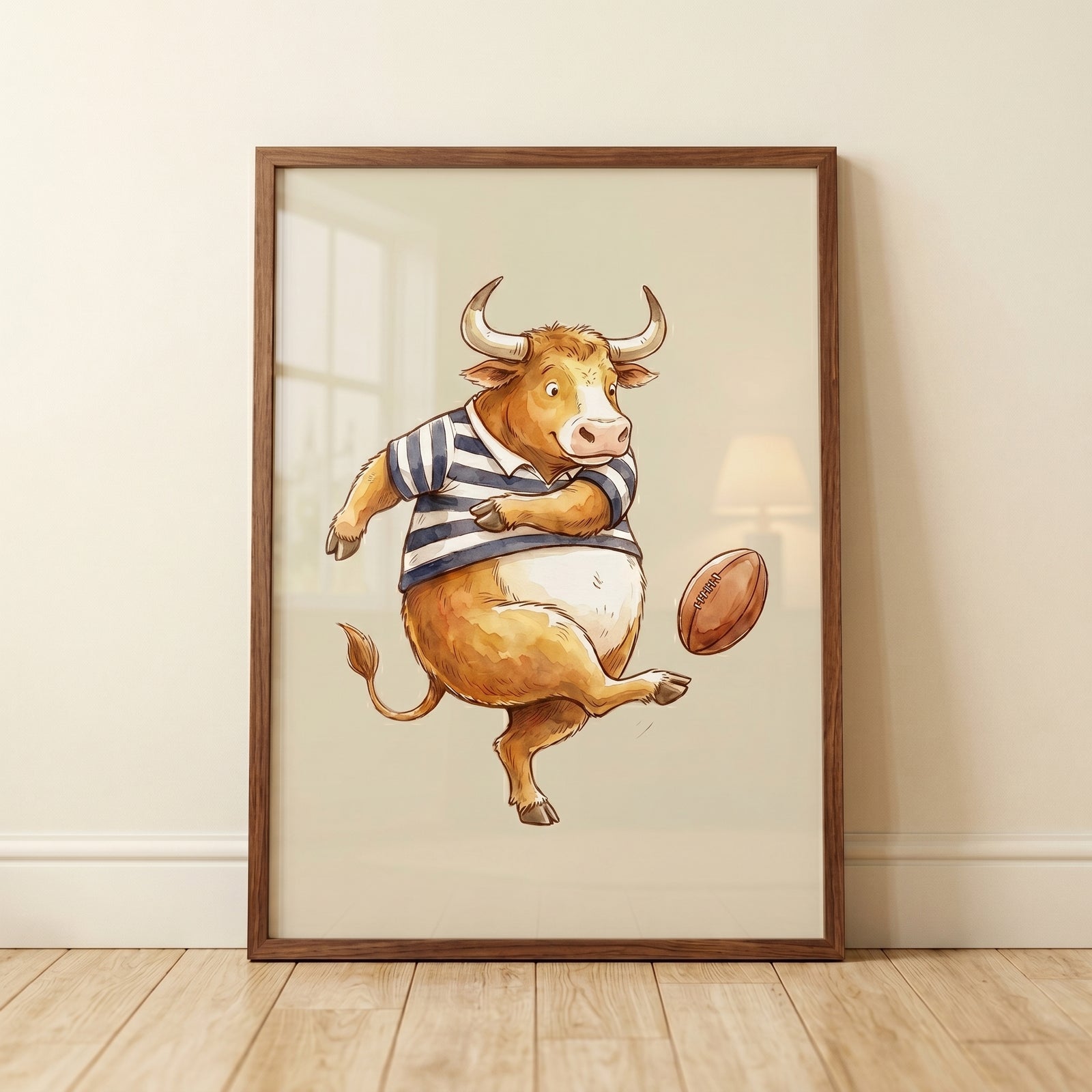 Striped jersey kicking bull wall art features a cartoon bull in a blue and white shirt kicking a brown football.