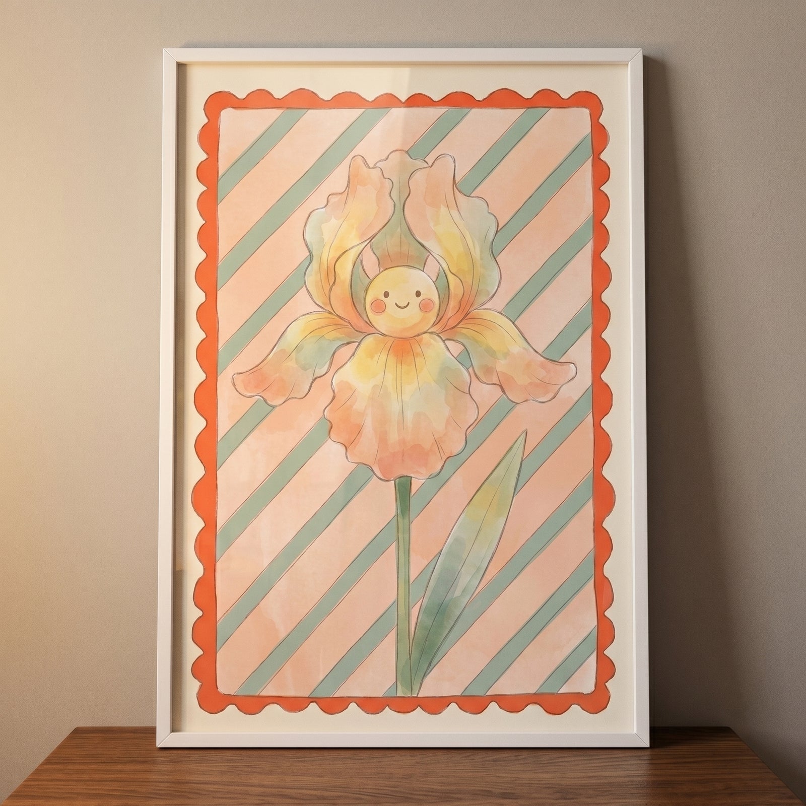 Striped peach iris flower wall art with a cute smiling face, scalloped orange border, and white frame on a wooden surface.