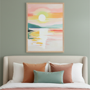 Bedroom with a beige upholstered bed and colorful throw pillows. A large framed impressionistic painting of a vibrant sunset over water and mountains hangs centered above the bed on a sage green wall.