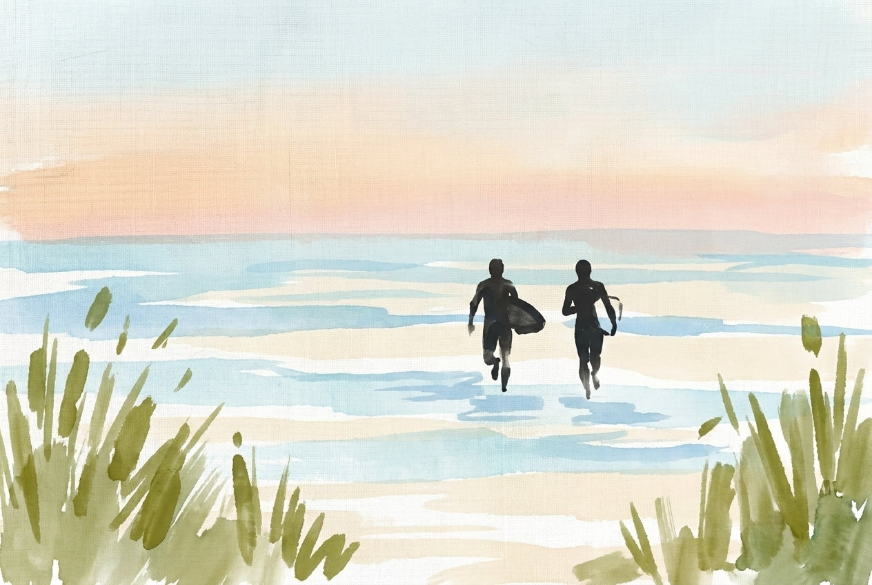 Two surfers sprint toward gentle blue waves under a pastel sunrise, seen from behind tall beach grasses on a wide sandy shore.

