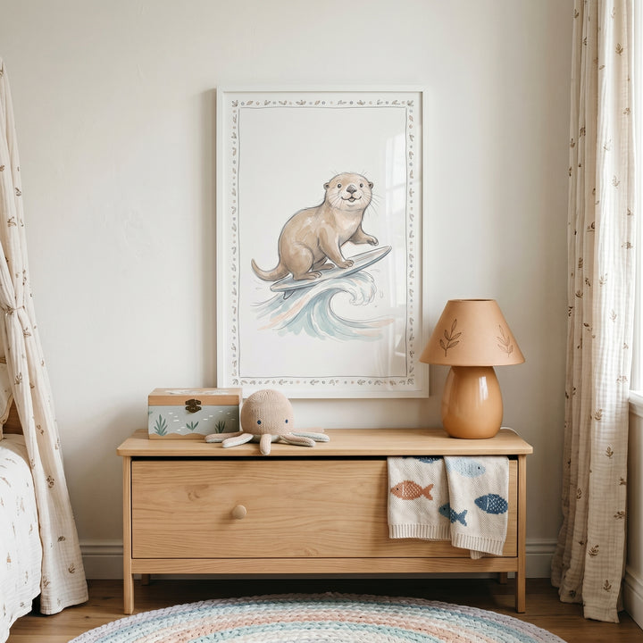 Surfing otter wall art hangs above a wooden chest with a plush octopus and a tan lamp next to a colorful circular rug.