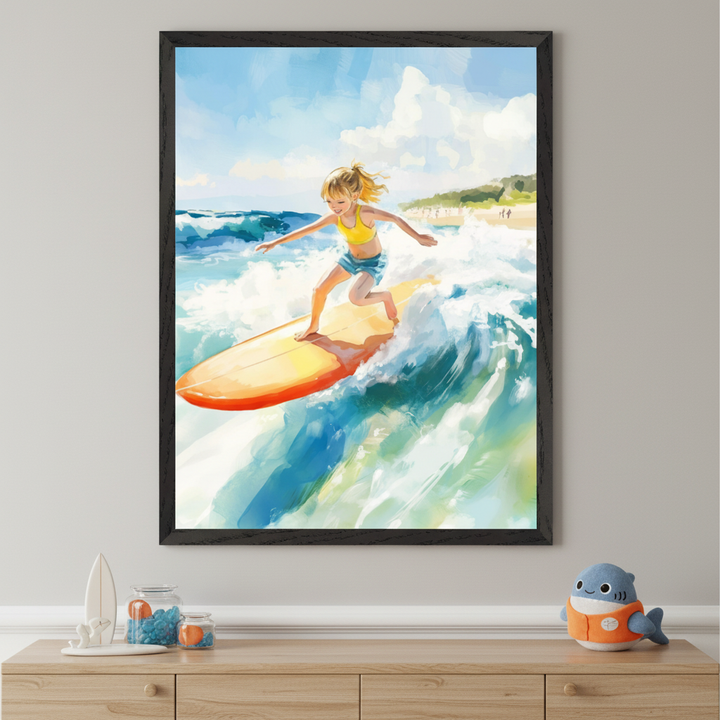 A young girl catches a wave on an orange surfboard, wearing a yellow top and blue shorts, with wind in her hair and a joyful expression. The framed painting brings coastal adventure and summer fun to a neatly decorated space with ocean-inspired accents.
