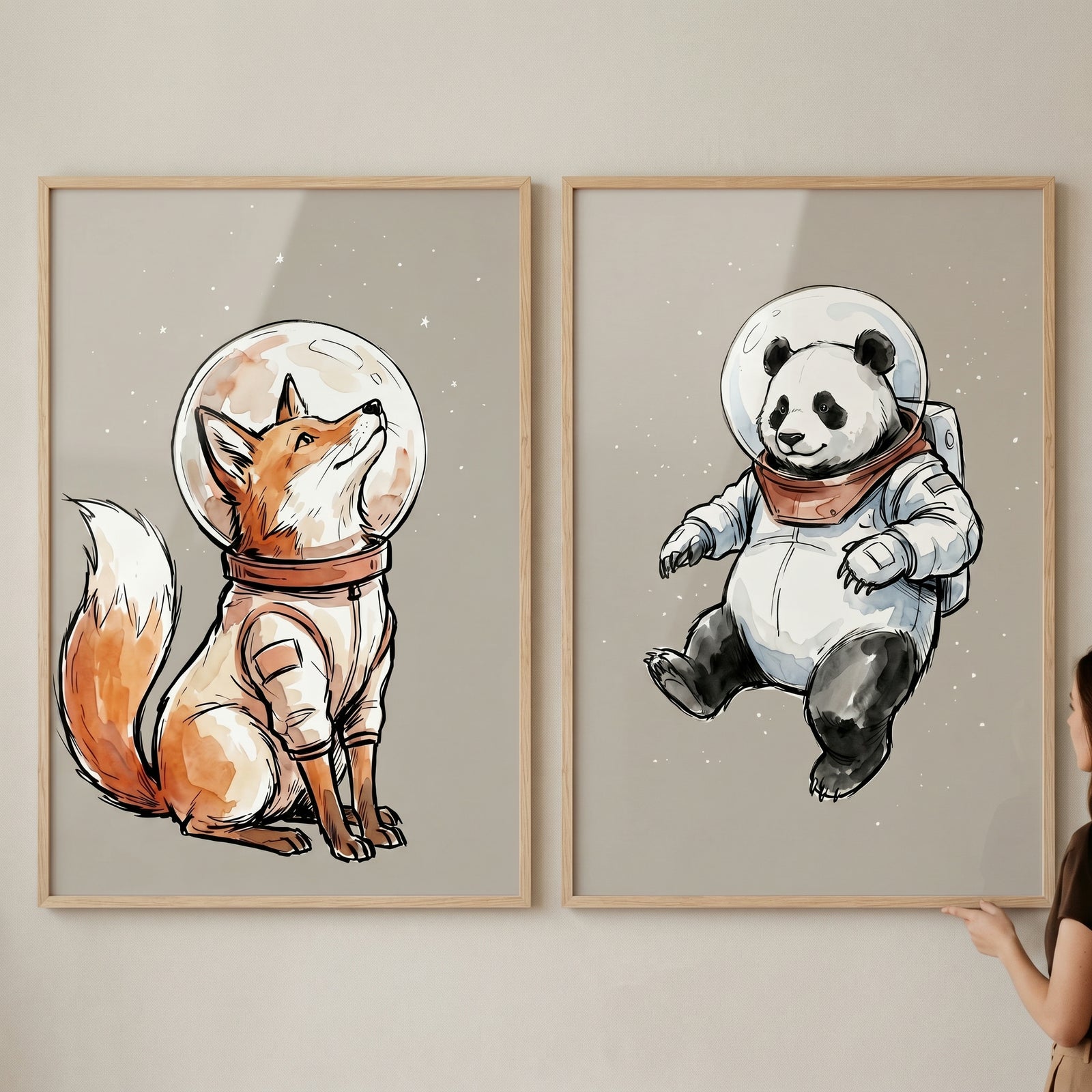 Terracotta accent astronaut animal wall art set of 2 featuring a fox and panda in space suits on a gray background.