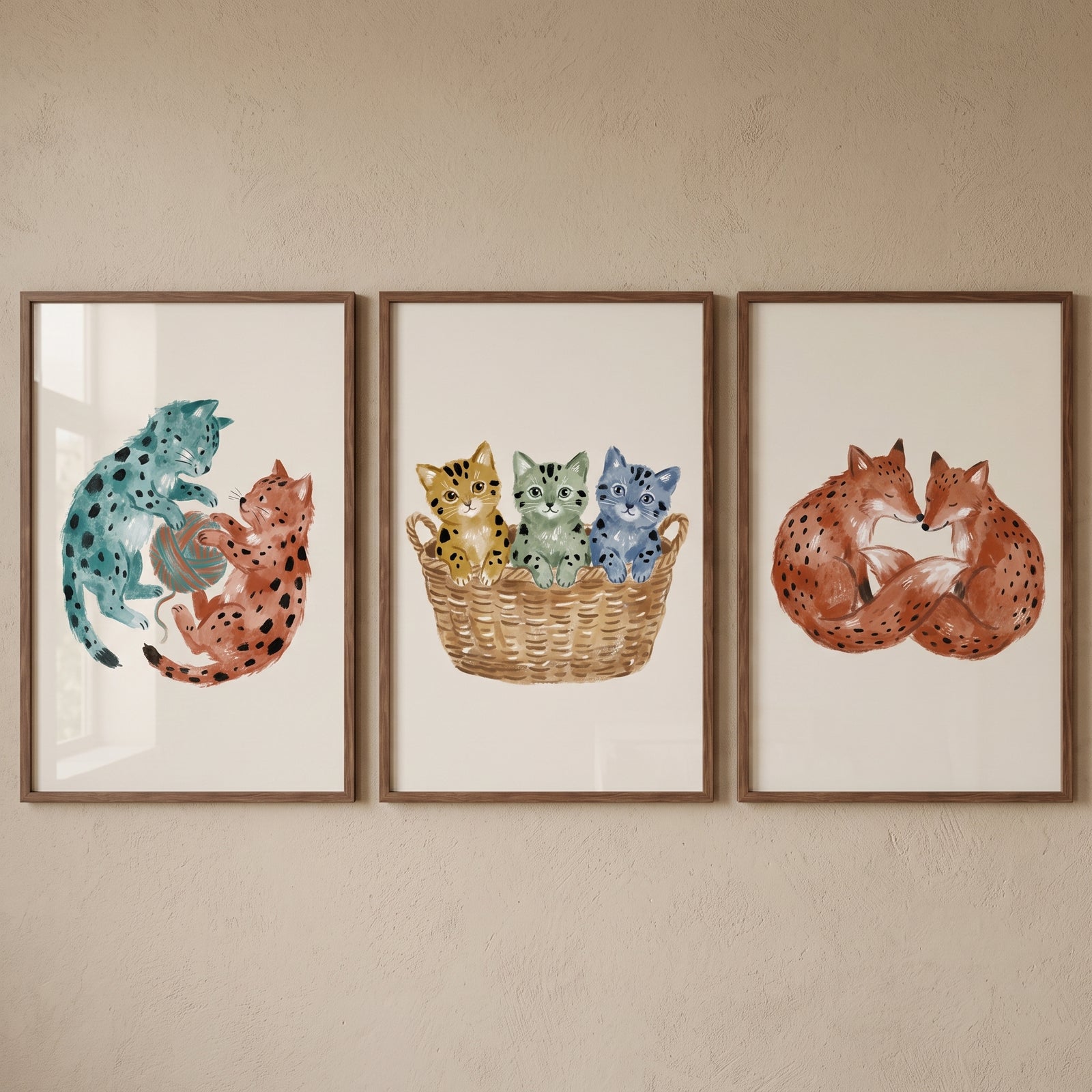 Terracotta teal spotted animal wall art set of 3 with kittens playing, kittens in a basket, and a pair of foxes.