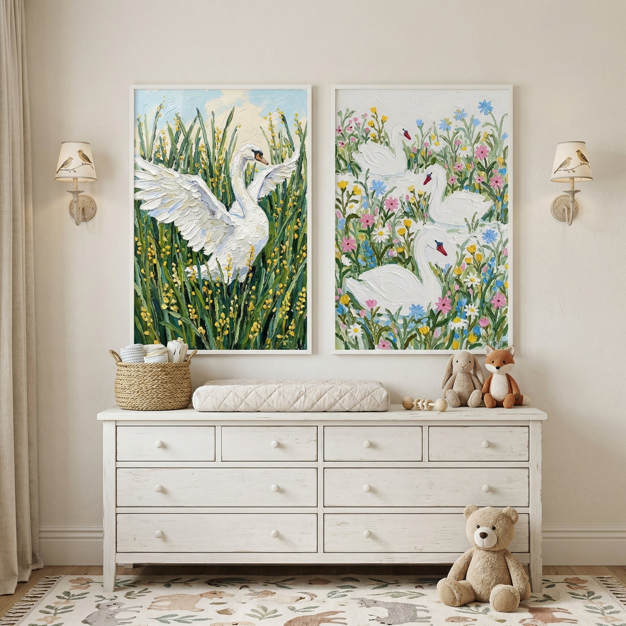 Soft neutral nursery with a white dresser and changing pad beneath two framed swan paintings, one showing a swan with wings open in tall green grass and yellow flowers and the other showing three swans surrounded by colorful blooms. Cozy details like plush toys, a woven basket, wall sconces, and a patterned rug create a gentle welcoming space for a baby.