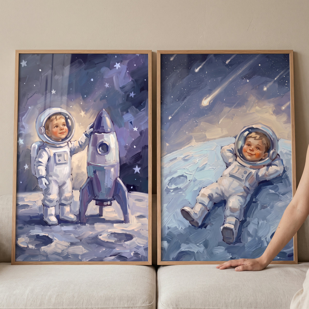 Textured moon baby astronaut wall art set of 2 with a child in space gear next to a rocket and under shooting stars.