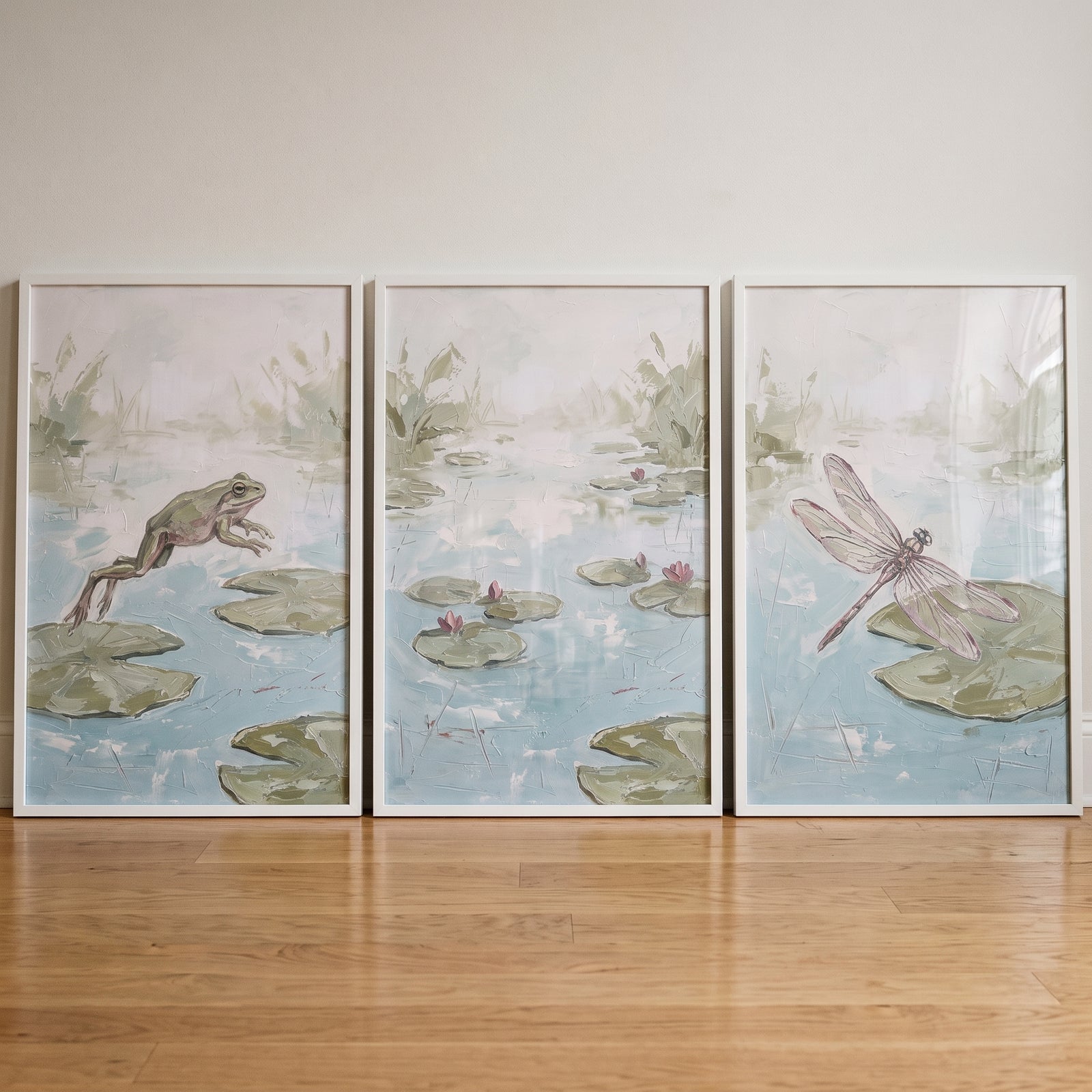 Textured mossy green pond wall art set of 3 featuring a leaping frog, a dragonfly, and lily pads with blooms in calm water.