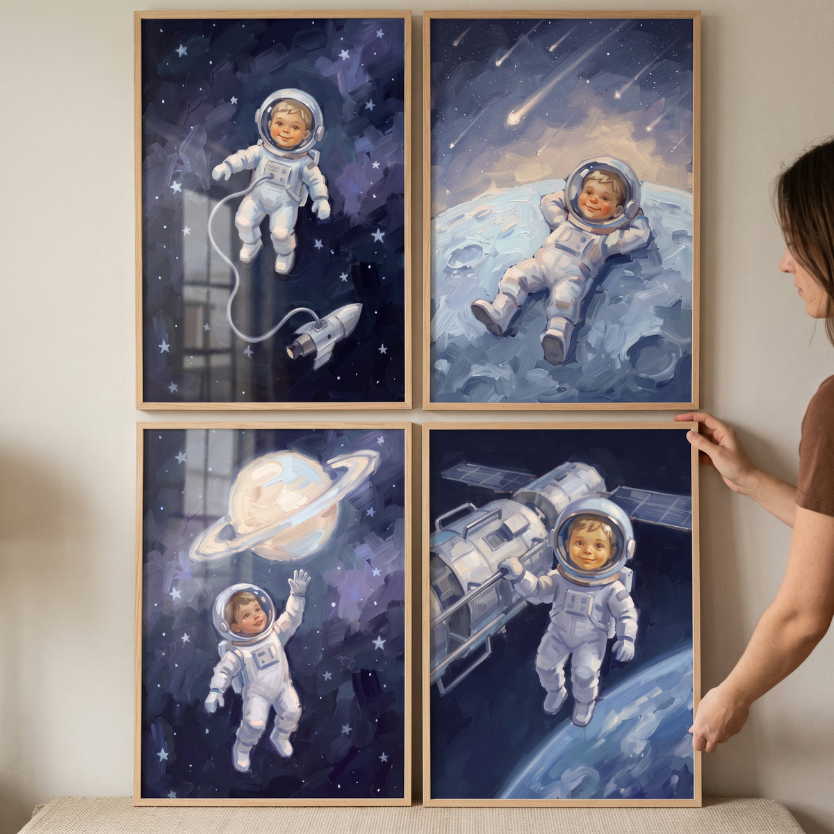 Textured nebula baby astronaut artwork set of 4 featuring a child floating in spacesuits among stars and planets.