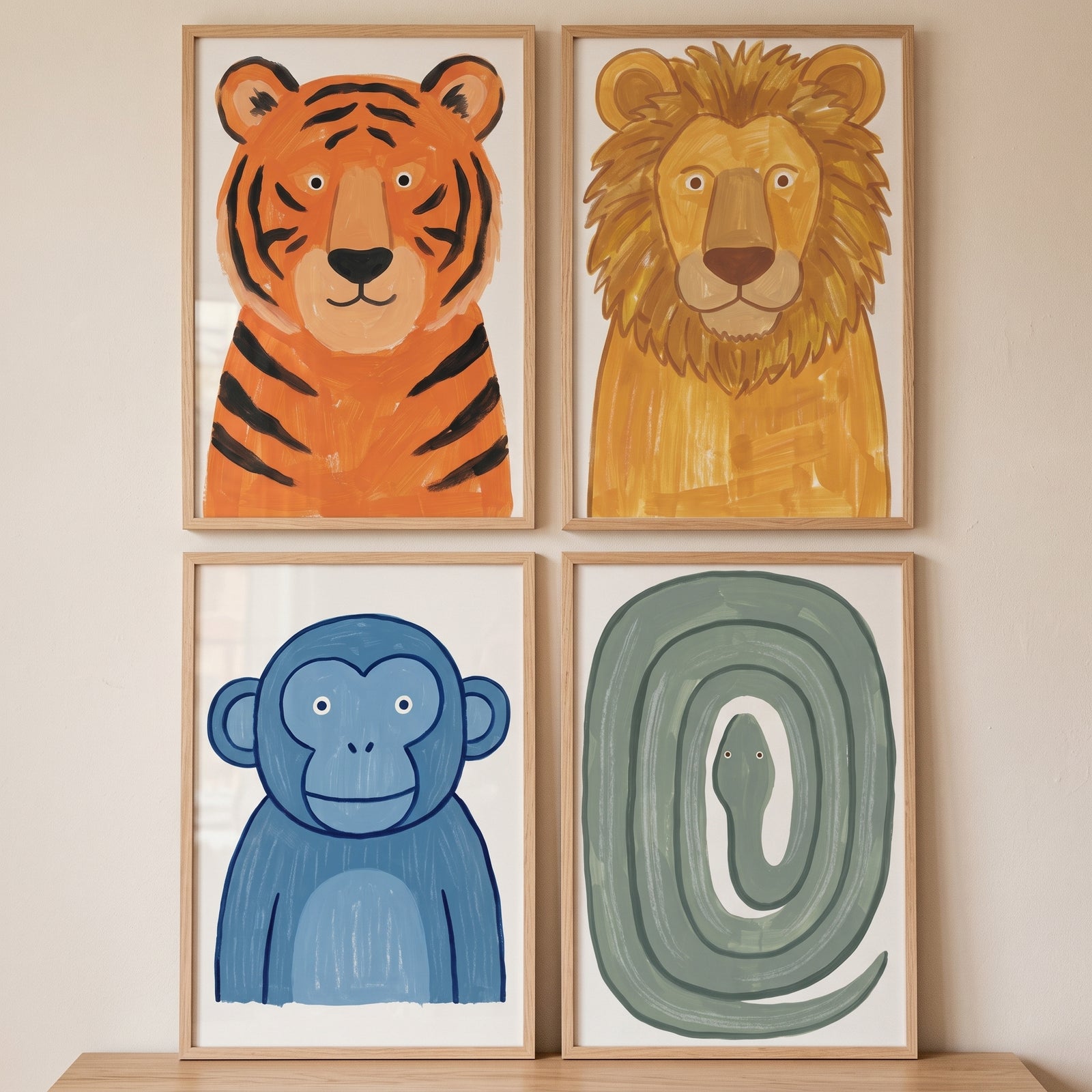 Textured safari animals wall art set of 4 with a tiger, lion, blue monkey, and coiled green snake in light wood frames.