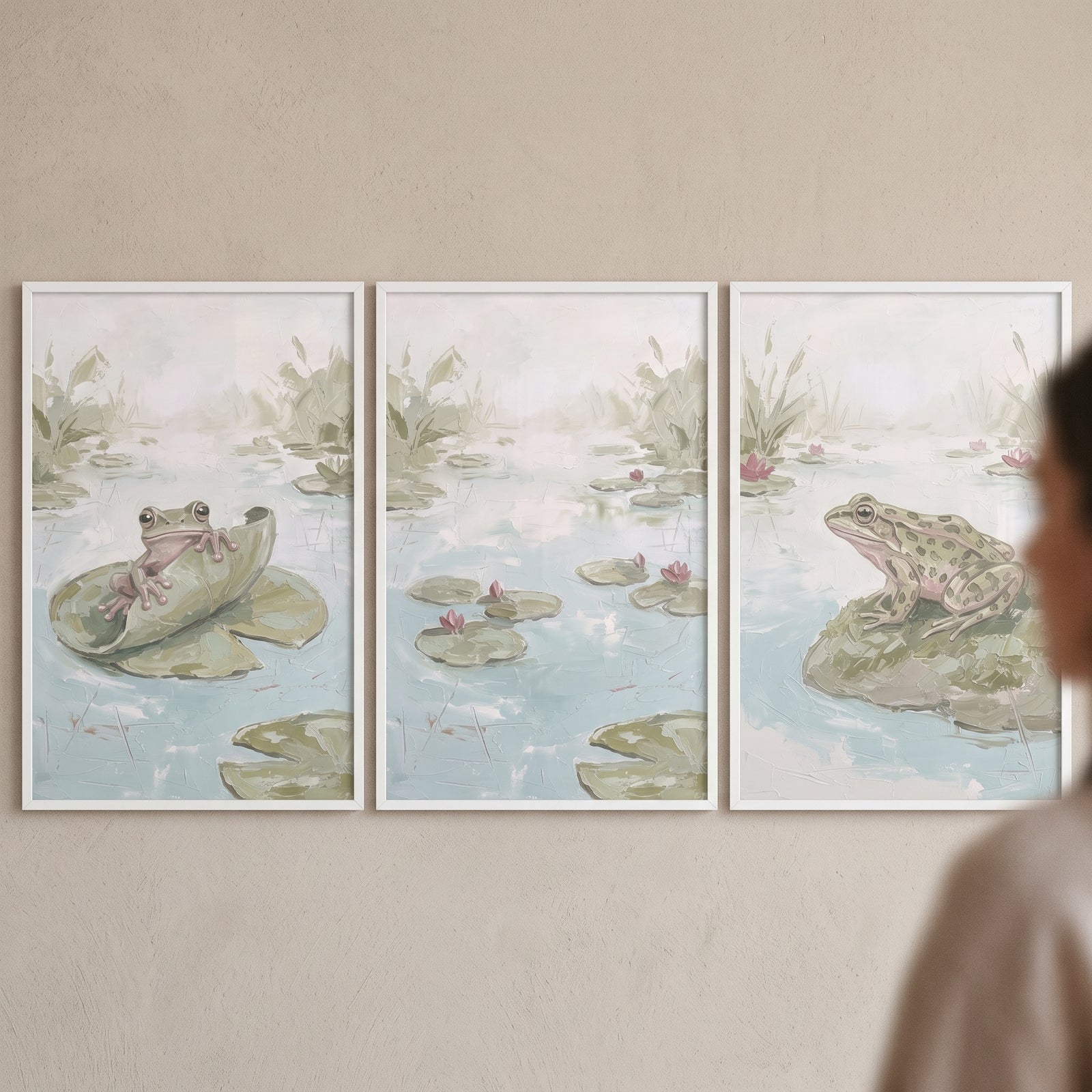 Textured sage lily pad pond wall art set of 3 depicts watercolor frogs and pink lilies in a serene pond scene.
