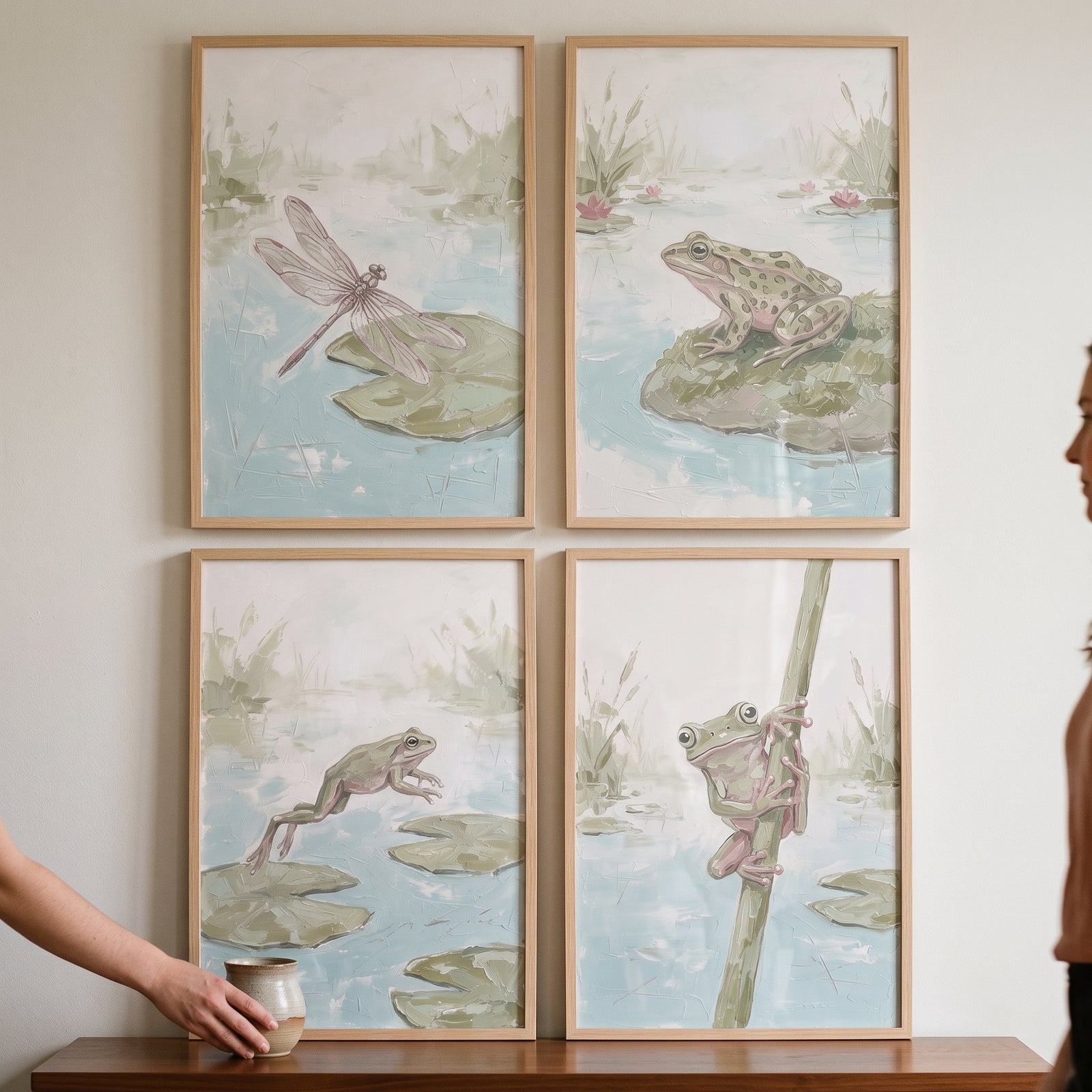 Textured sage pond animals wall art set of 4 features frogs and a dragonfly in soft pond scenes with light wood frames.