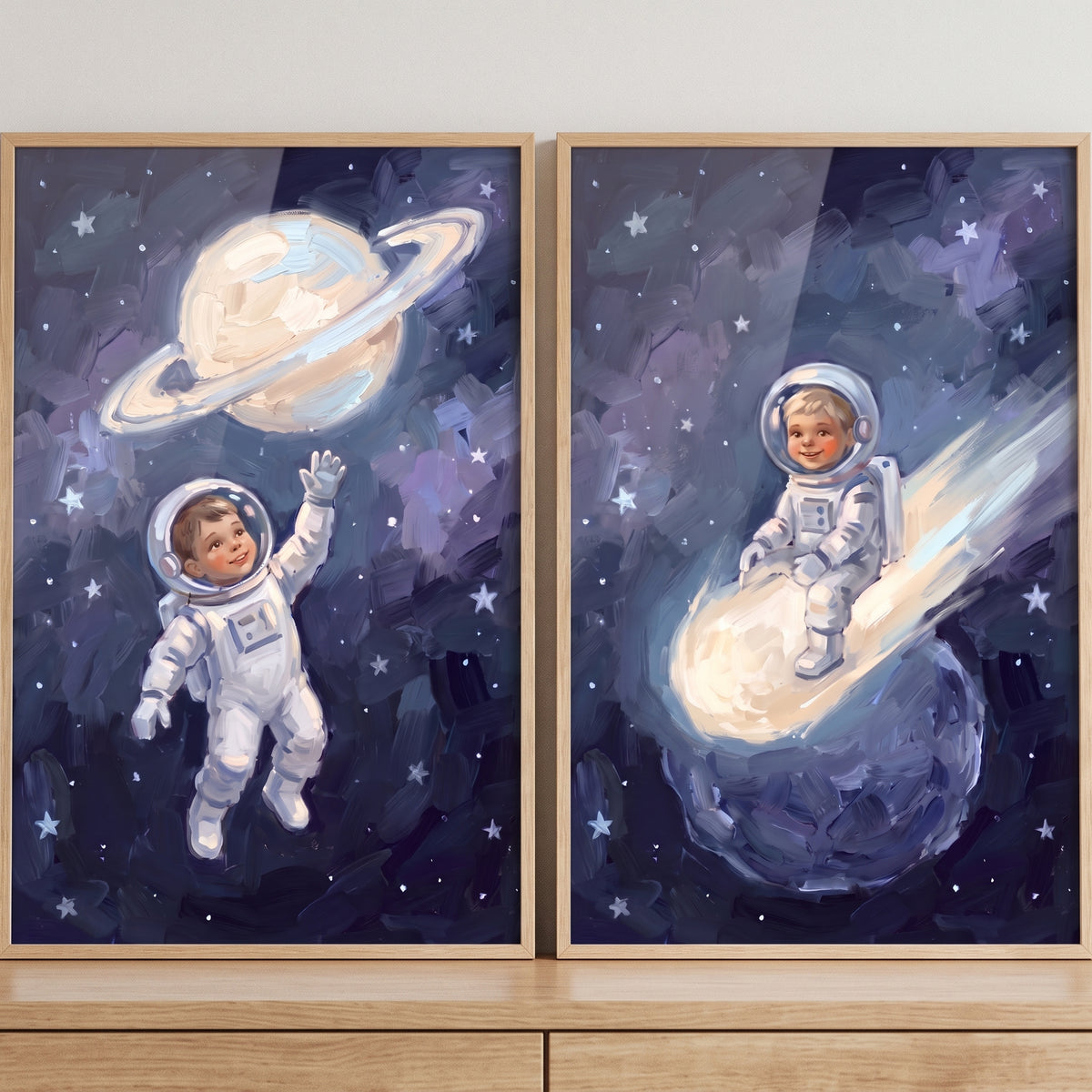 Thick brushstroke baby astronaut artwork set of 2 showing young astronauts near a ringed planet and riding a comet.