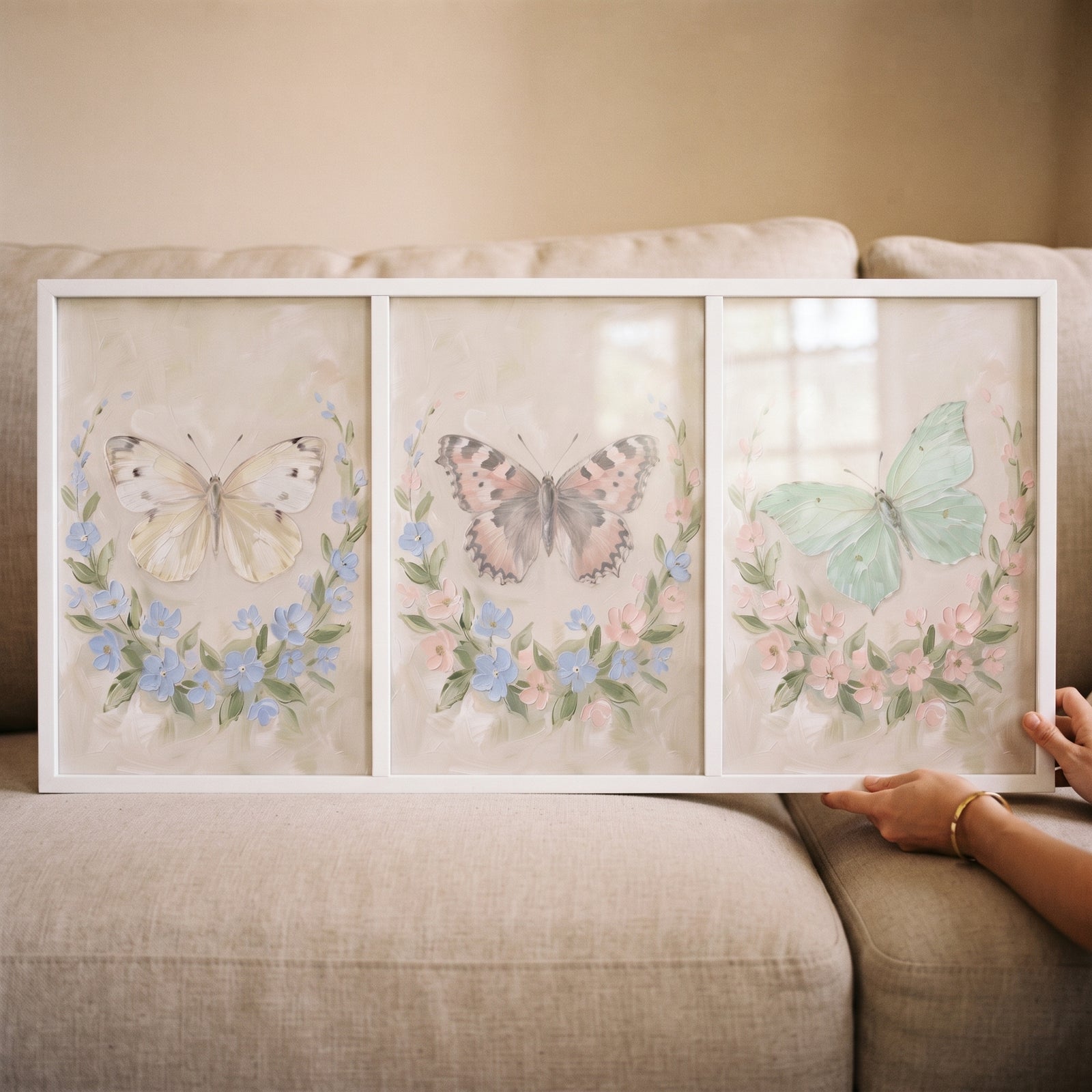 Thick texture garden butterfly wall art set of 3 featuring cream, pink, and green butterflies within floral wreaths.