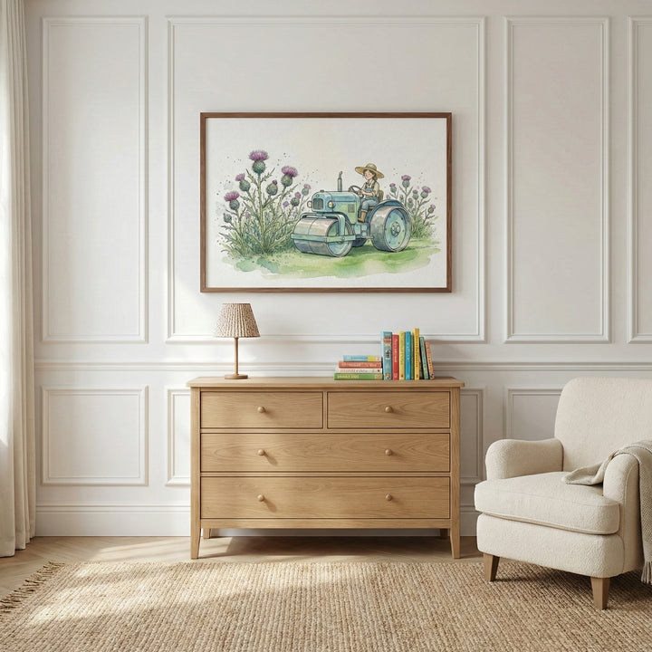 A cozy, light-filled room features a framed watercolor of a farmer on a vintage blue tractor surrounded by flowering thistles. The artwork hangs above a wooden dresser with books and a small lamp, adding a playful countryside charm to the decor.