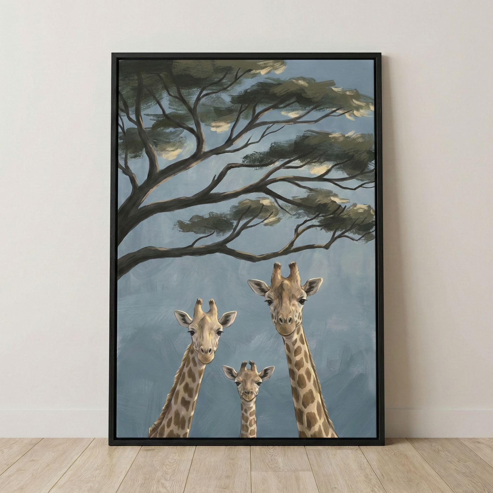 A vertical framed artwork depicts three giraffes—two adults and a smaller calf—peering forward from the bottom of the frame. The animals are rendered with distinct brown-patterned coats and soft facial features. Above them, the dark, sprawling branches of a large tree with textured green foliage reach across the scene. The background consists of a muted, hazy blue with visible brushstrokes, creating a calm atmosphere. 