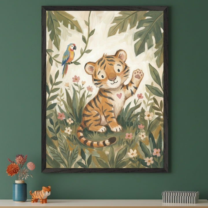 Modern room with a dark green wall. A framed illustrative painting of a cute tiger cub waving, with a parrot and jungle foliage, hangs above a white shelf. On the shelf are a blue vase with flowers, a small tiger figurine, and a striped box.