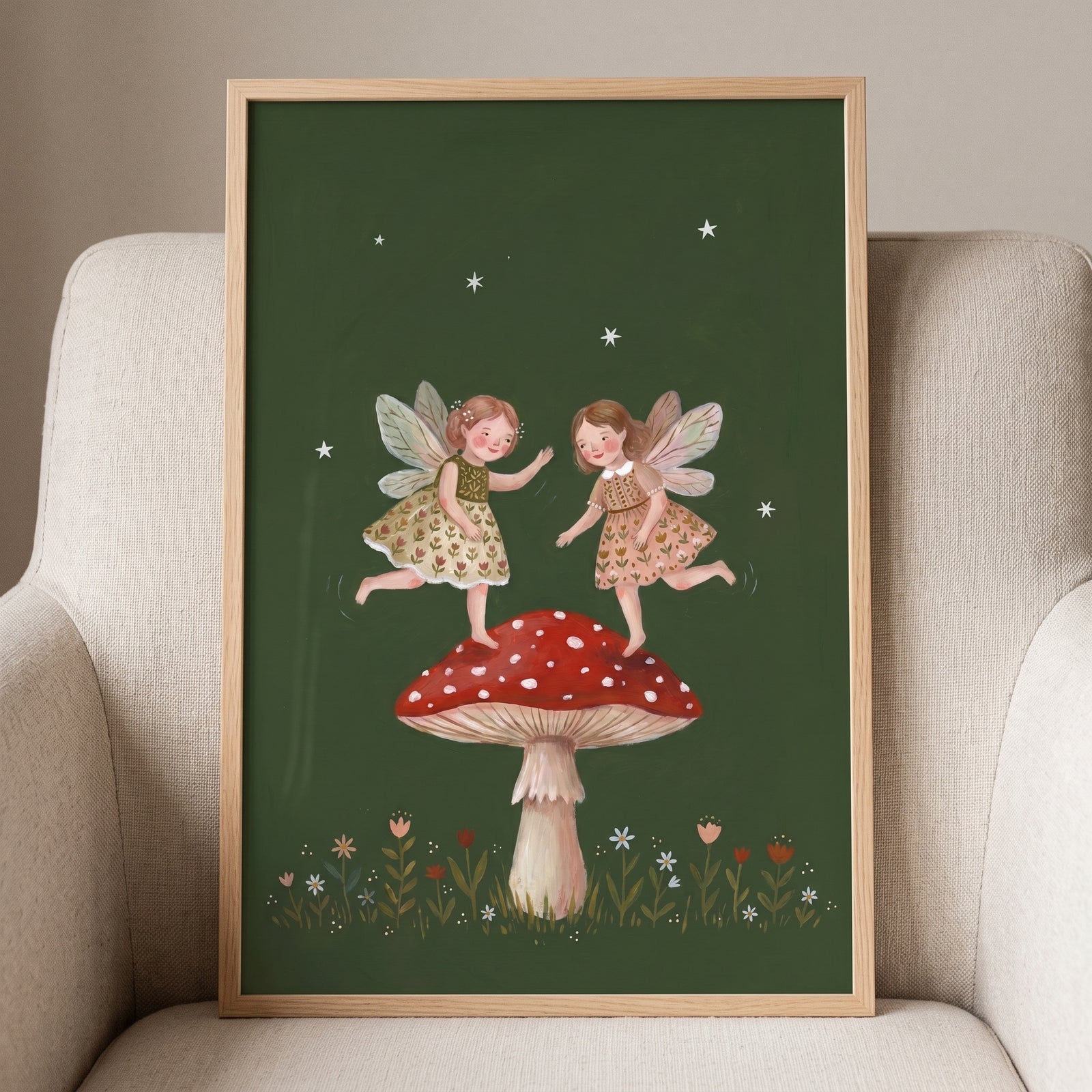 Two fairies dance on a mushroom in this toadstool dancing garden fairies wall art against a dark green starry background.