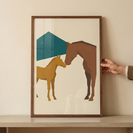 Minimalist touching nose brown horse wall art with a mare, foal, and teal geometric shapes in a wooden frame.