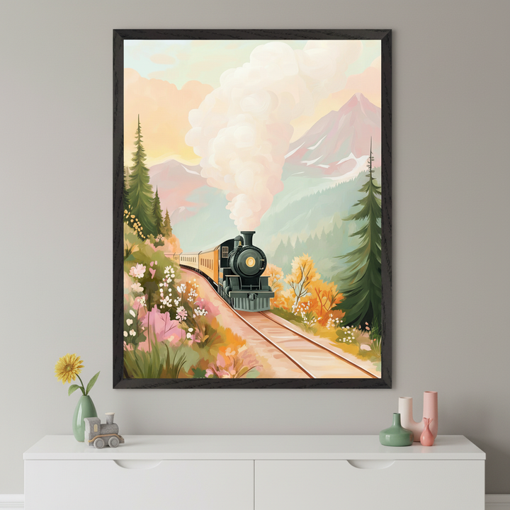 A vintage steam train travels along a curved track through a colorful autumn landscape, with mountains and pine trees in the background and billowing smoke in the sky. The artwork leans against a crib in a softly lit nursery, next to a plush gray elephant toy.