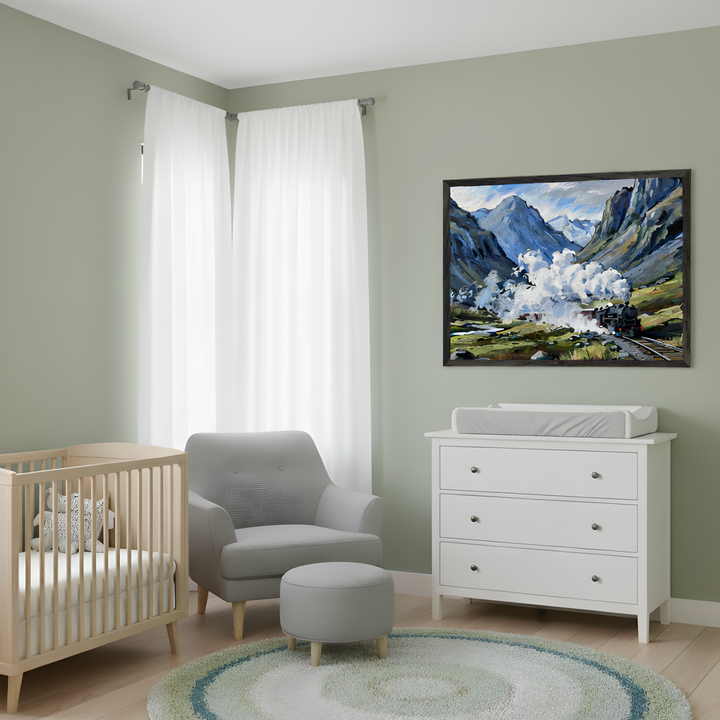 Peaceful nursery with soft green walls featuring a framed painting of a steam train traveling through a mountain valley, its engine releasing thick white smoke. The room includes a wooden crib, a cozy gray armchair with a matching ottoman, a white dresser with a changing pad, and a round rug in calming green and cream tones.