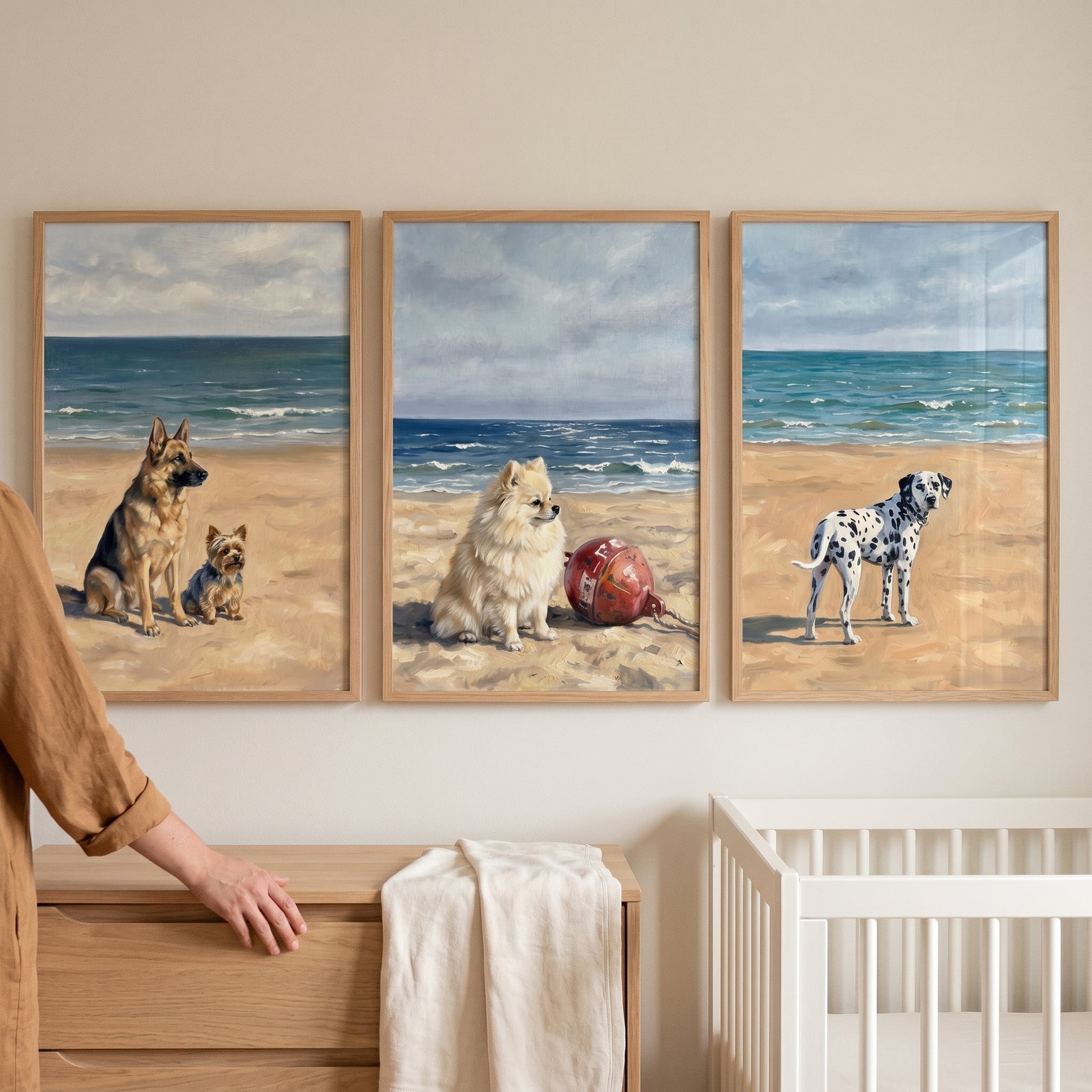 Tranquil maritime horizon dog wall art set of 3 hanging above a crib, featuring dogs on a beach by the ocean.