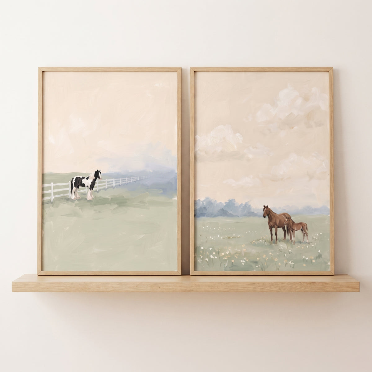 Tranquil peach sky horse wall art set of 2 on a wooden shelf, showing horses in soft green fields with a white fence.