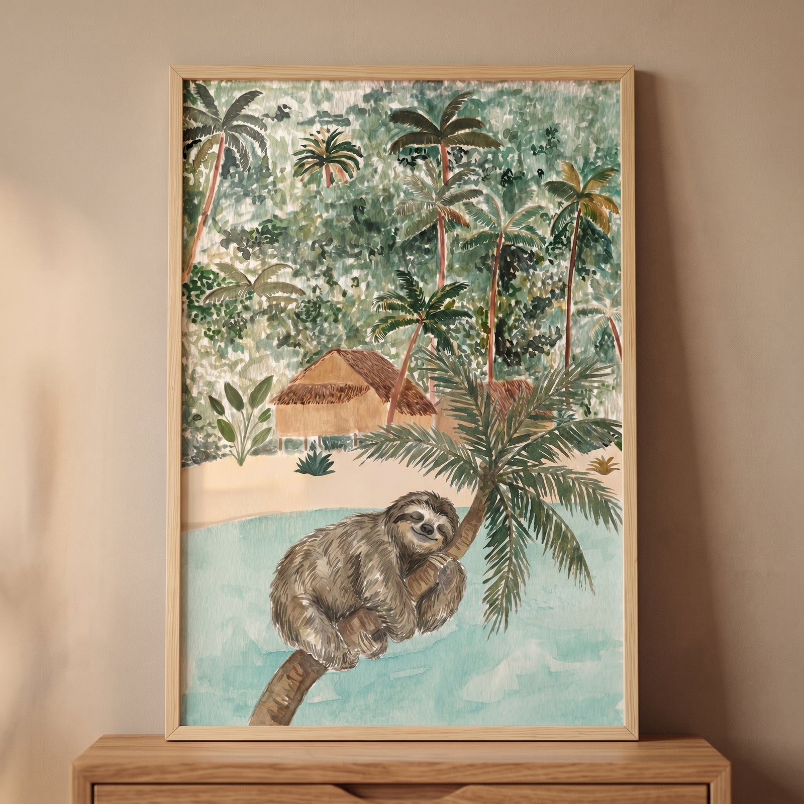 Watercolor style tropical beach sleeping sloth wall art in a wood frame shows a sloth on a palm tree over water.