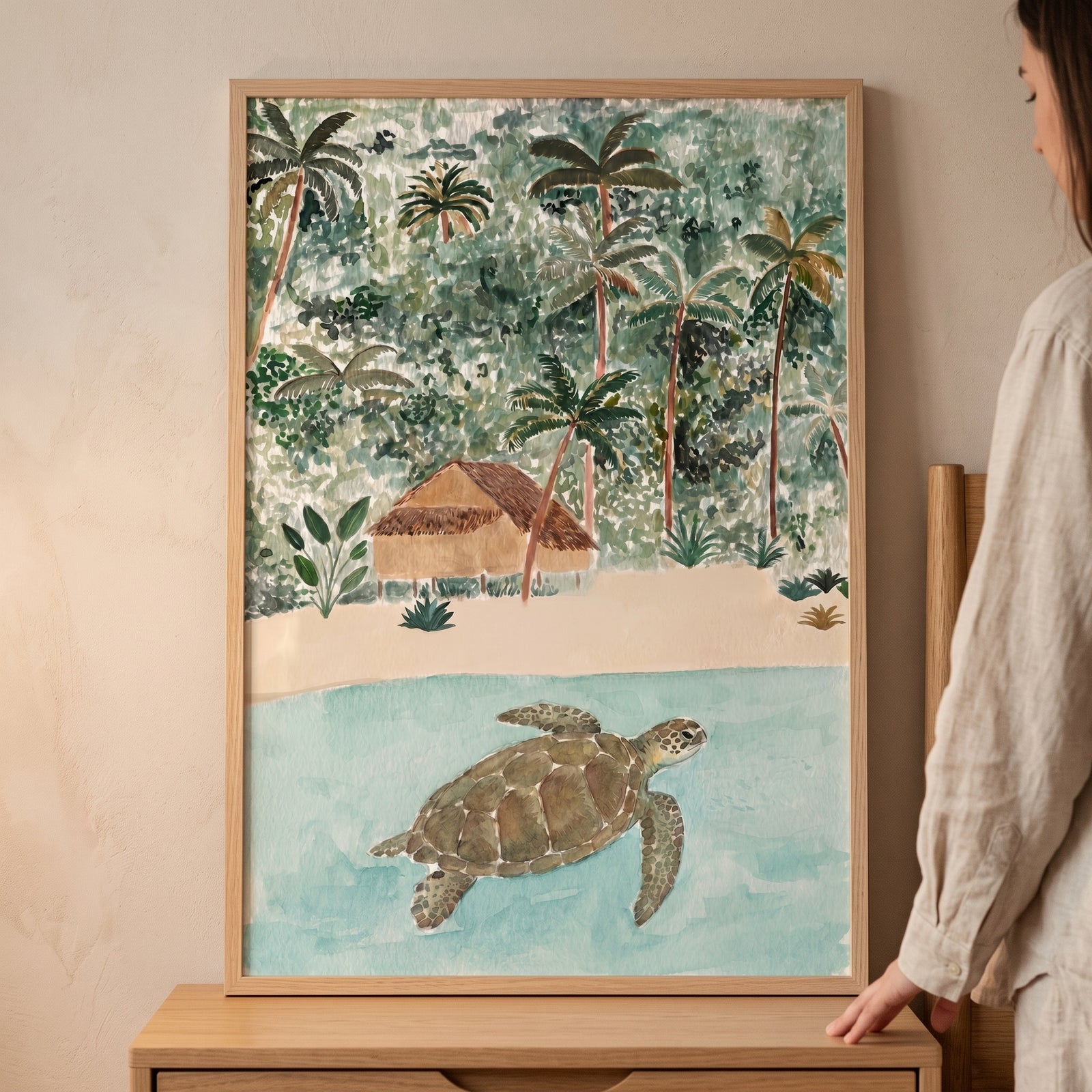 Tropical ocean swimming turtle wall art featuring a sea turtle, beach, and palm trees in a light wood frame.