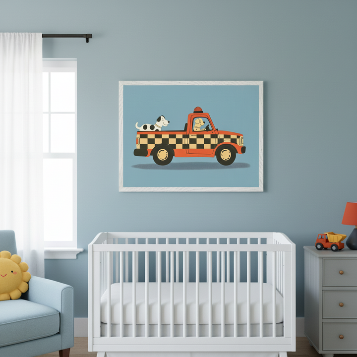 Modern nursery featuring a white crib. A large framed cartoon print of an orange checkerboard truck with two dogs hangs above the crib. A light blue armchair and a gray dresser are also in the room.