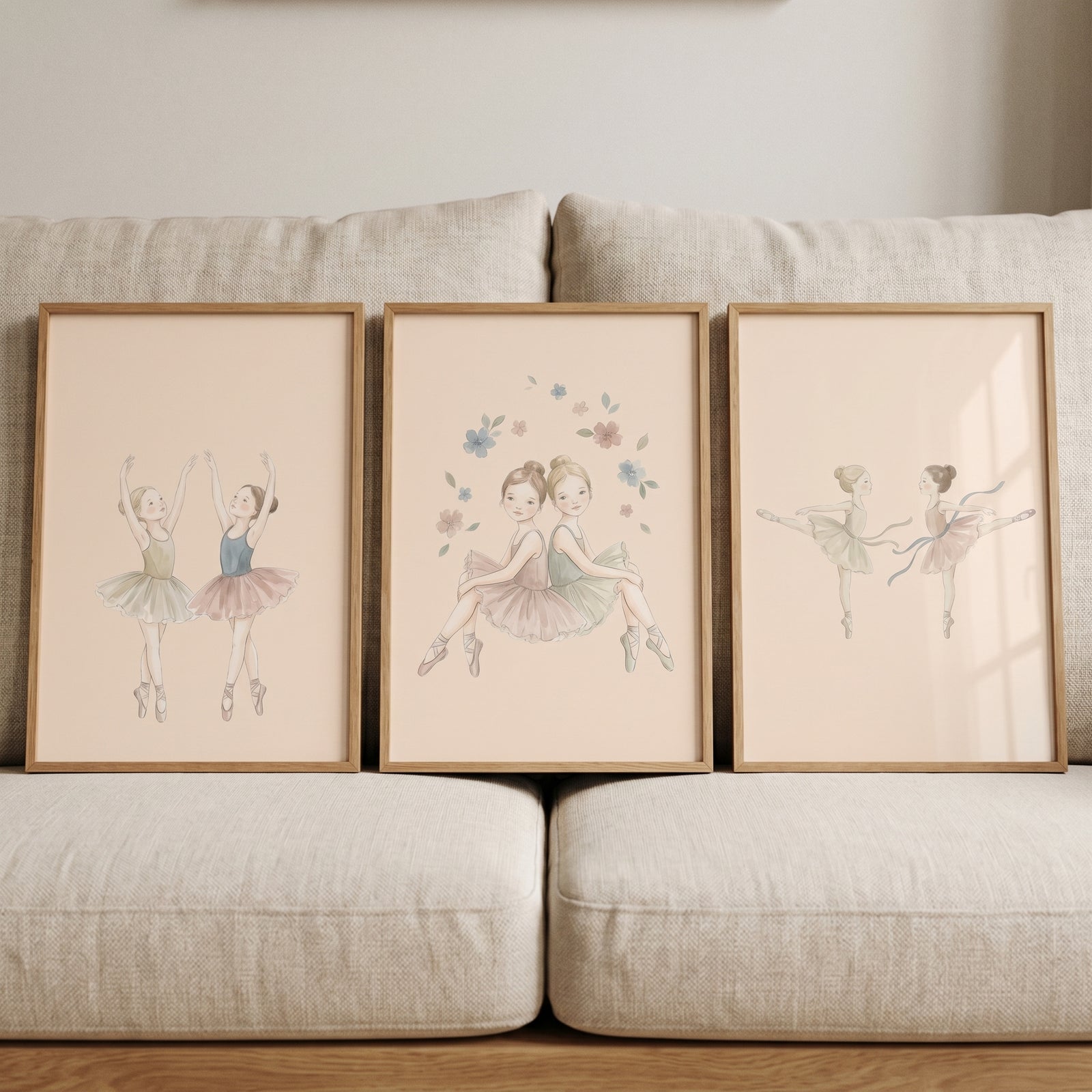 Tutu ballerina girls wall art set of 3 includes three framed sketches of young dancers leaning against a neutral couch.