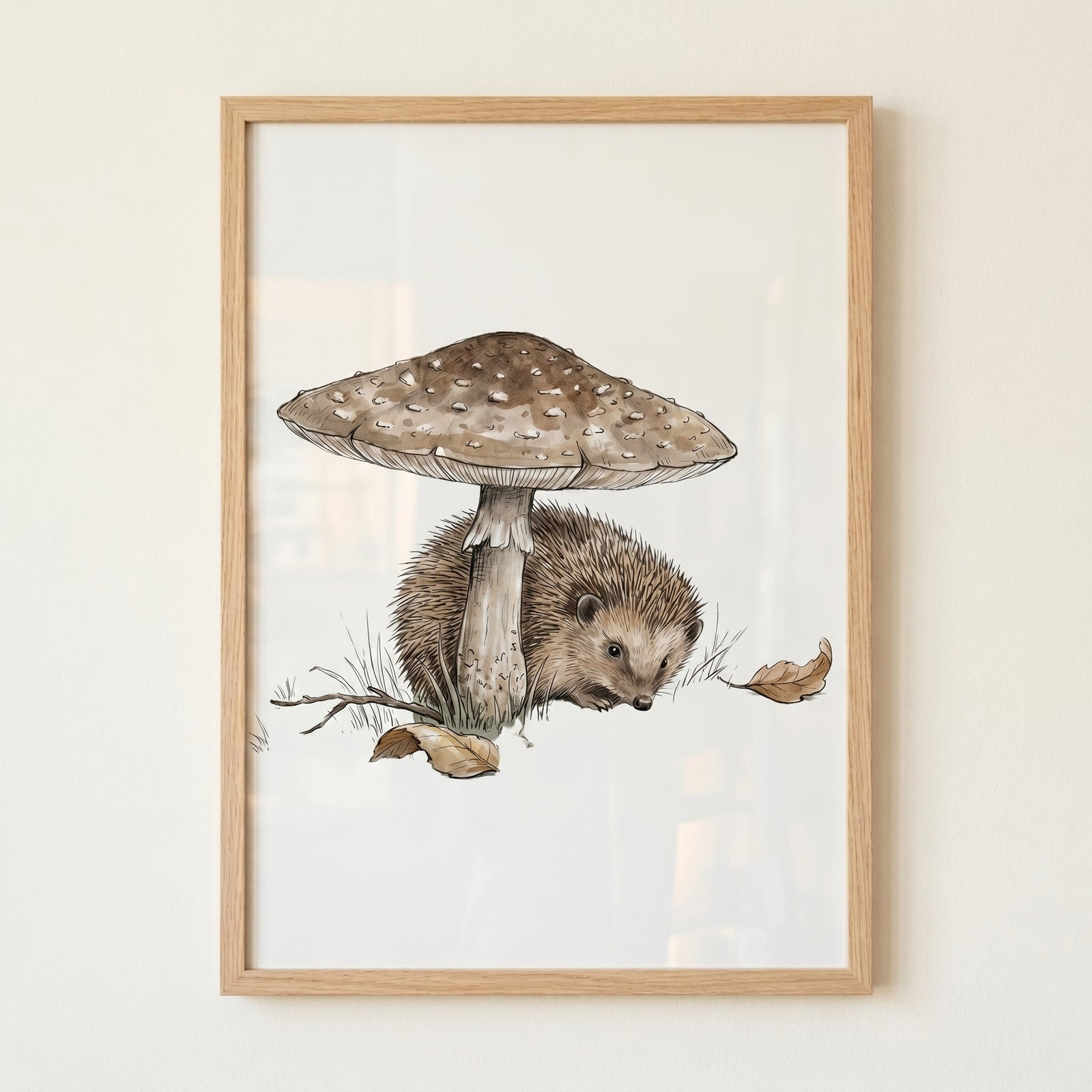 Under mushroom woodland hedgehog wall art of a brown hedgehog nestled beneath a large mushroom in a light wood frame.