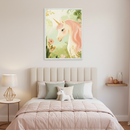 Modern kid's bedroom with a large framed illustration of a pink-maned unicorn in a pastel garden, centered above a bed with a cream padded headboard.