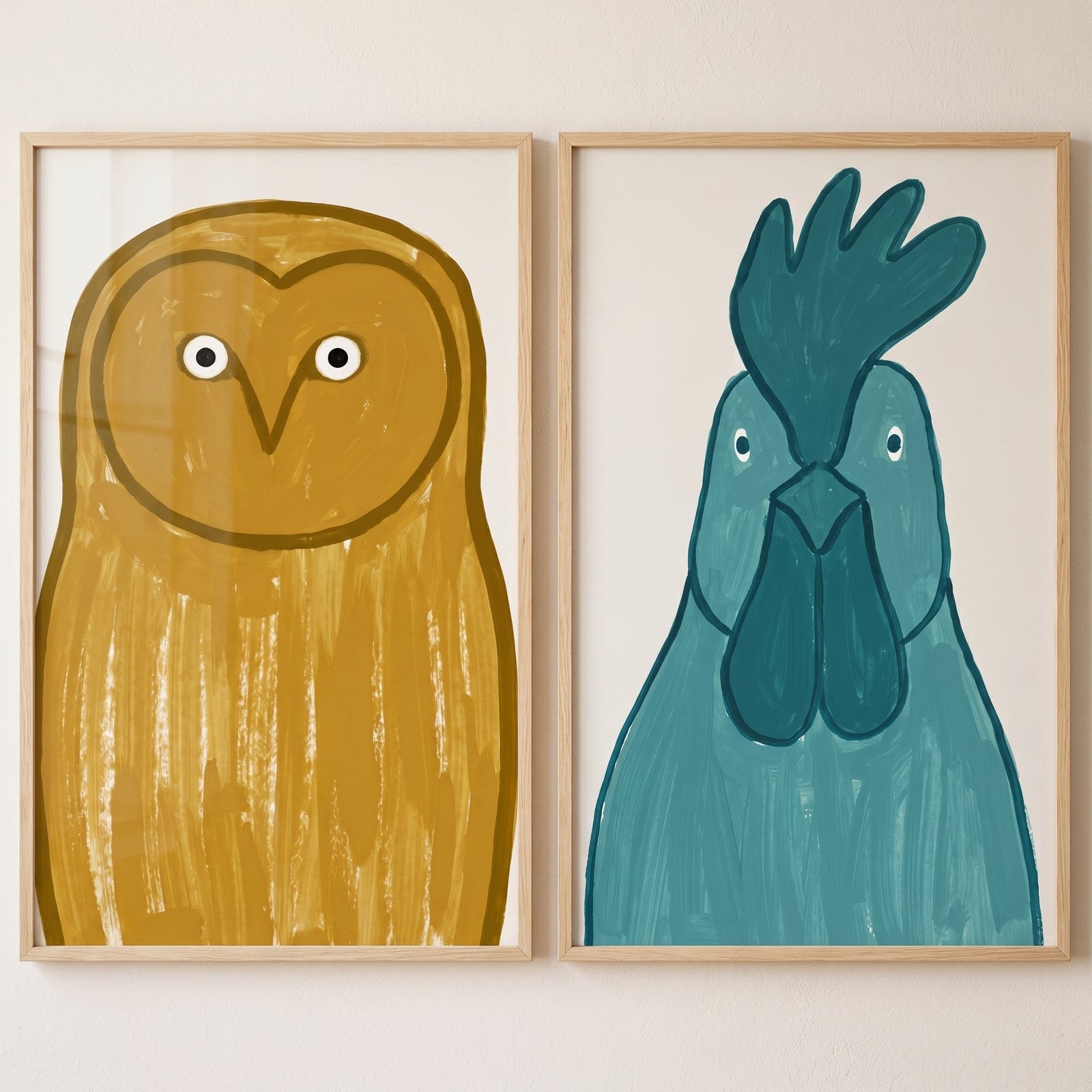 Vibrant bird print set of 2 featuring a mustard yellow owl and a teal rooster in light wood frames.