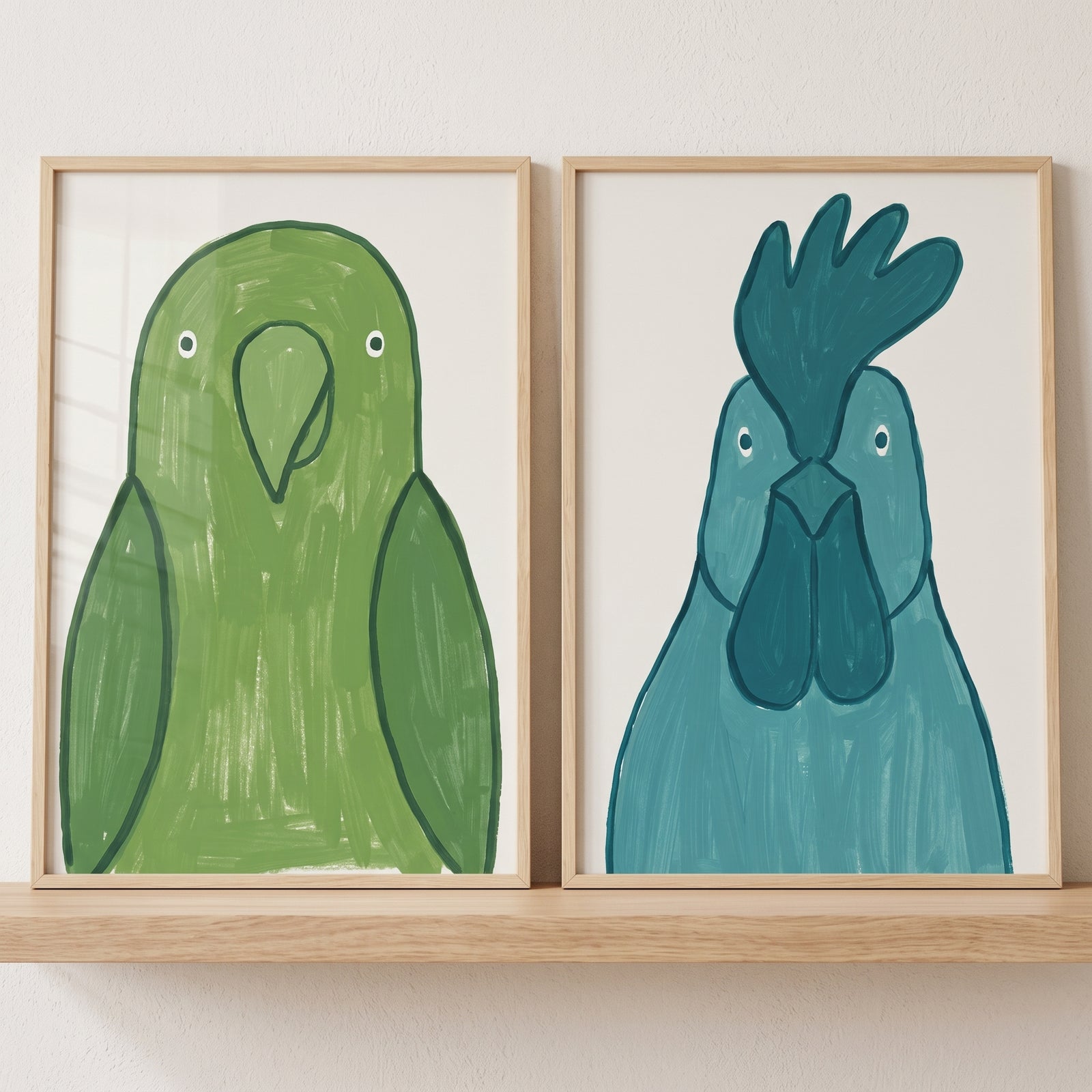 Vibrant textured bird wall art set of 2 featuring a green parrot and a blue rooster on a light wood shelf.