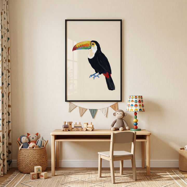 Vibrant yellow beak toucan bird wall art hangs above a wooden desk with a stuffed monkey, colorful lamp, and toy train.