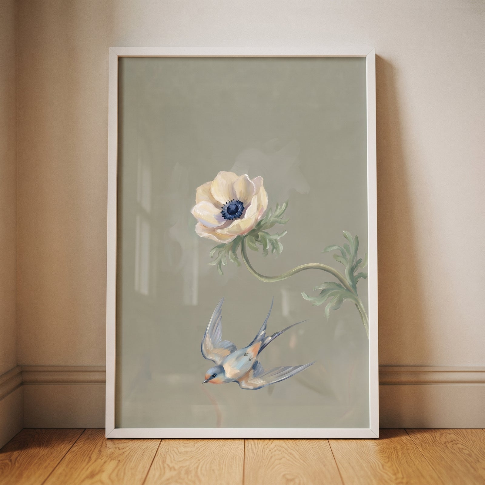 Vintage blue swallow floral wall art with a white anemone and bird in flight against a muted sage green background.