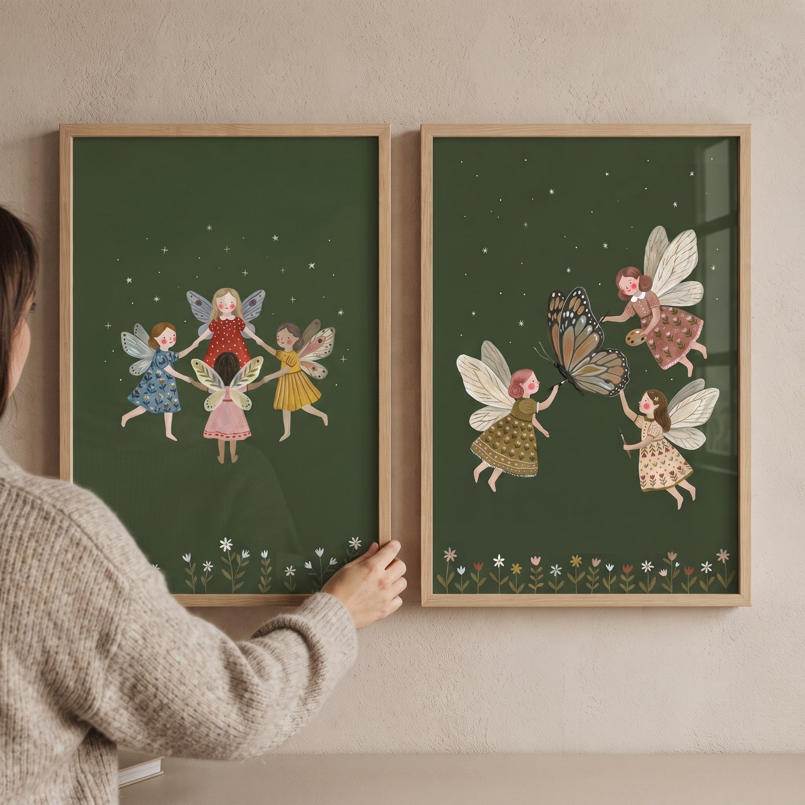 Vintage folk winged fairies wall art set of 2 featuring sprites dancing and a butterfly on dark green backgrounds.