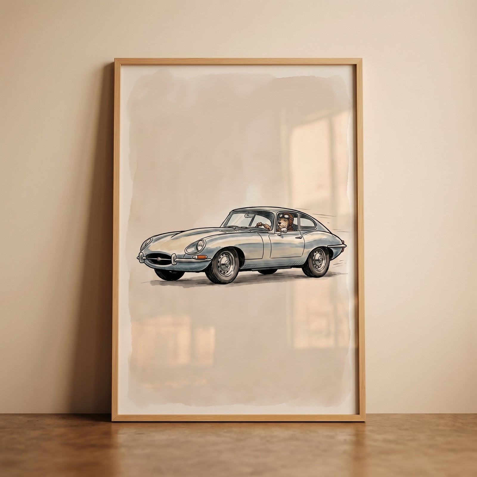 Vintage goggles driving dog wall art in a wood frame featuring a dog behind the wheel of a classic silver sports car.