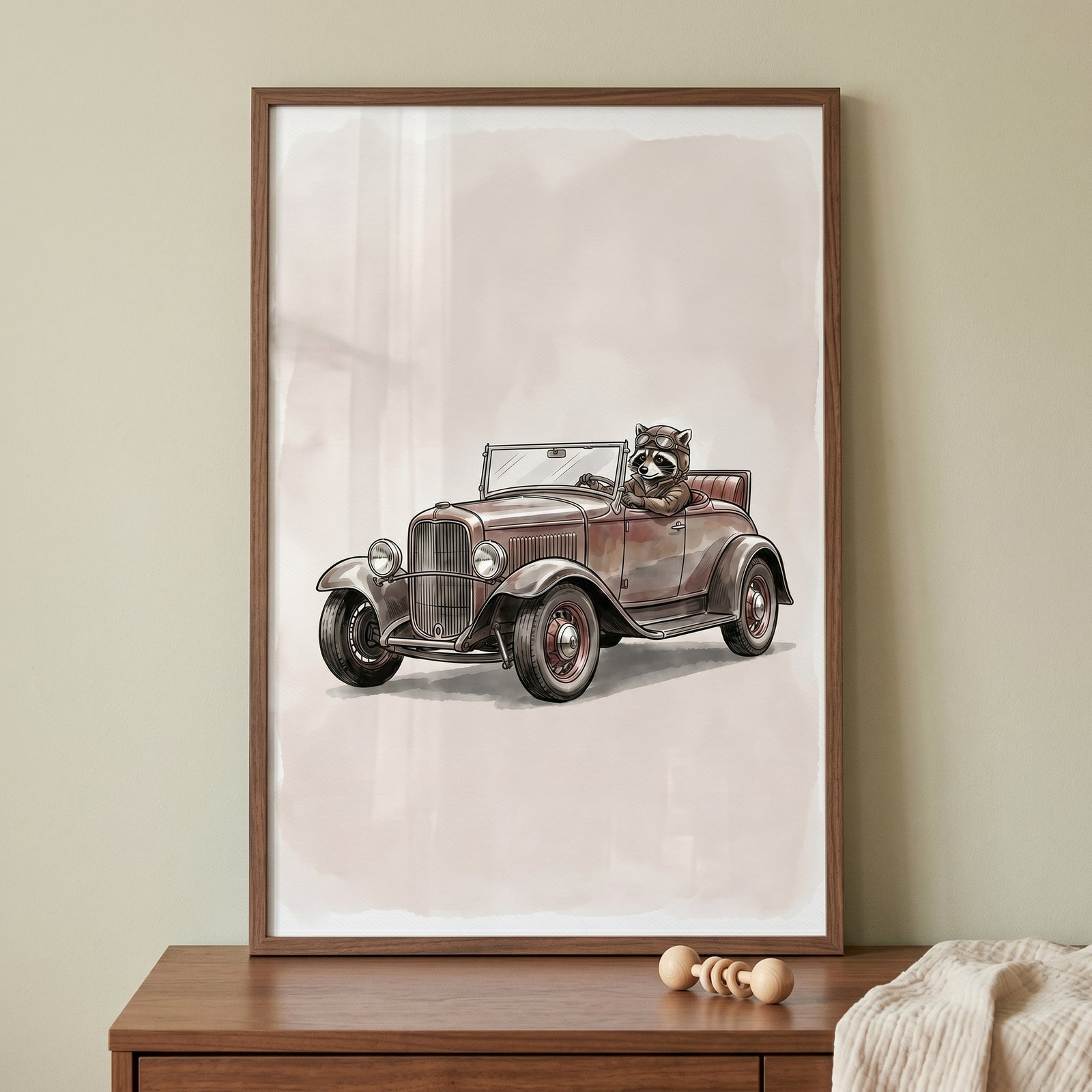 Framed vintage goggles driving raccoon wall art features a raccoon in a brown vintage car on a neutral, muted background.