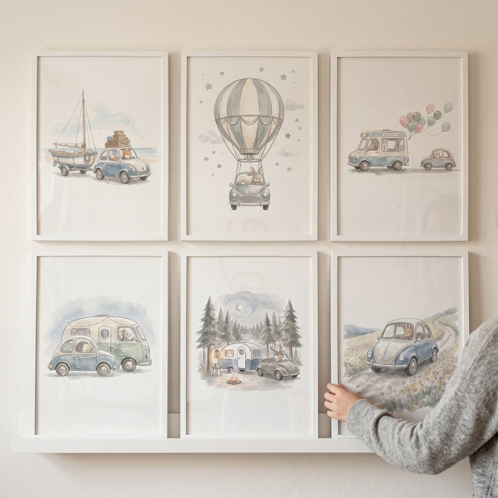 Vintage inspired traveling animals wall art set of 6 watercolor illustrations of animals in vehicles on a white shelf.